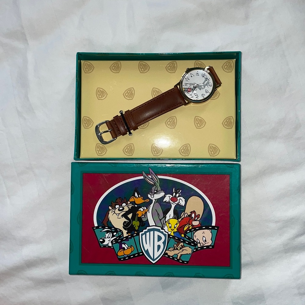 One looney watch , TM & 1994 Warner Bros brown Bugs